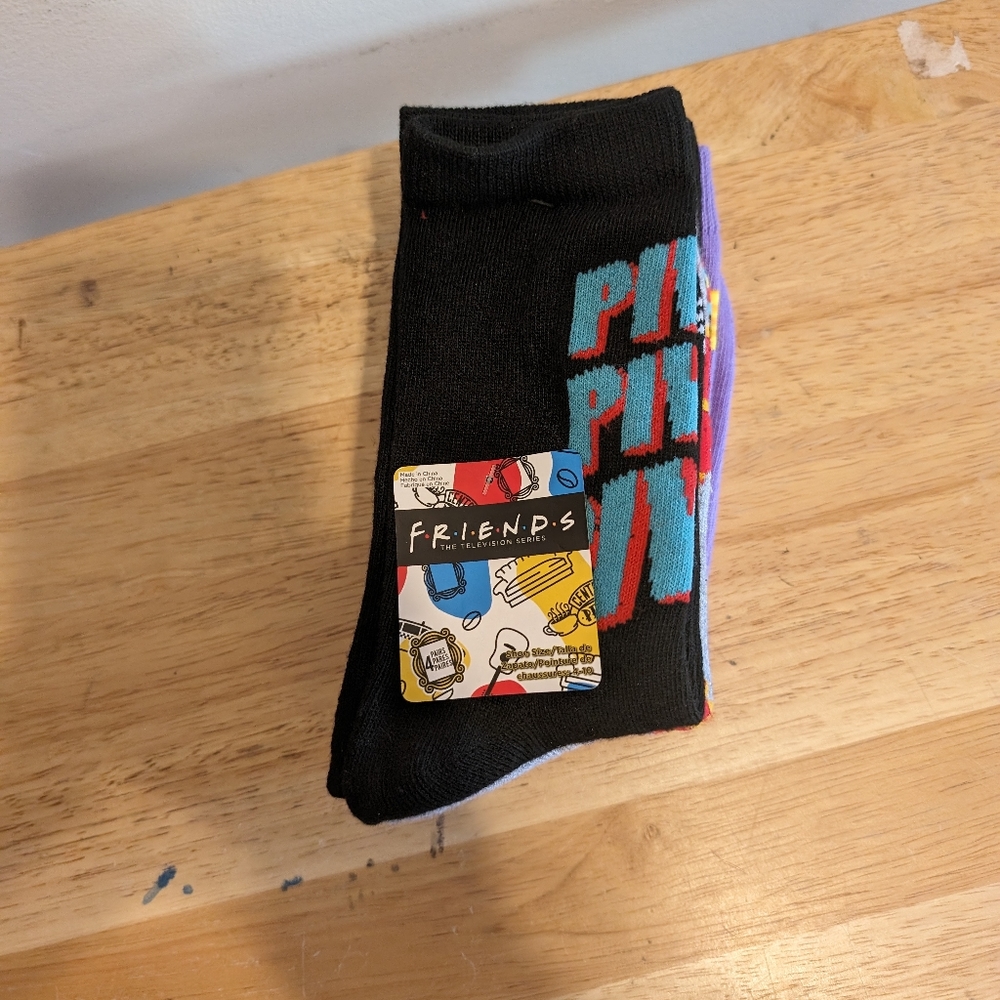 - 4 pair women socks  4-10 Friends